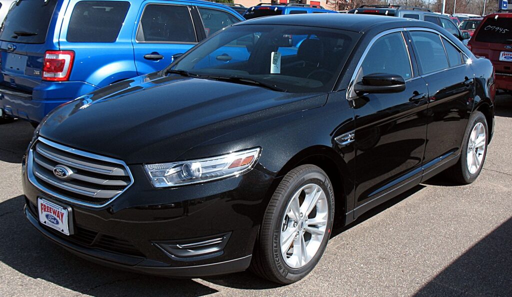 Ford recalls 2013 Ford Taurus and other models for defective right front axle.