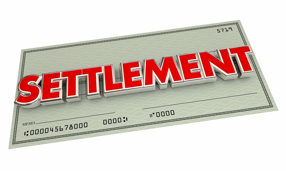 A green cashier's type check positioned diagonally, with SETTLEMENT written on the check in all-caps, bold, red letters, posing the question, Are personal injury settlements taxable in PA and NJ?