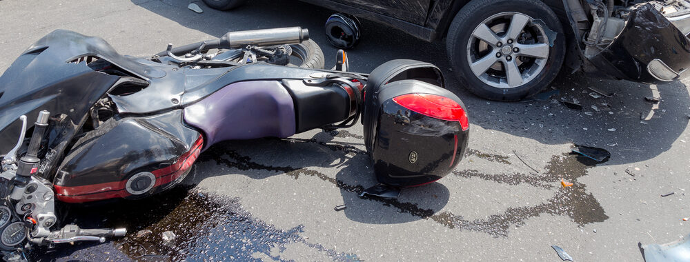 a motorcycle accident injury settlement with severe injuries, medical expenses after insurance coverage didn't cover it.