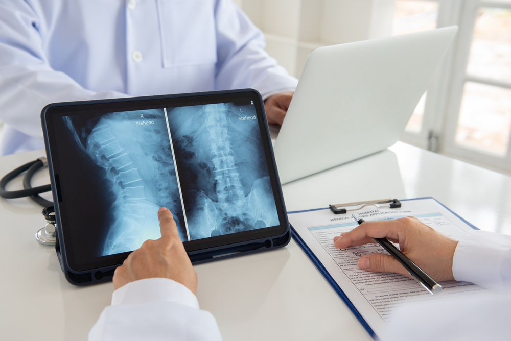 Herniated disc injury after a car accident settlement