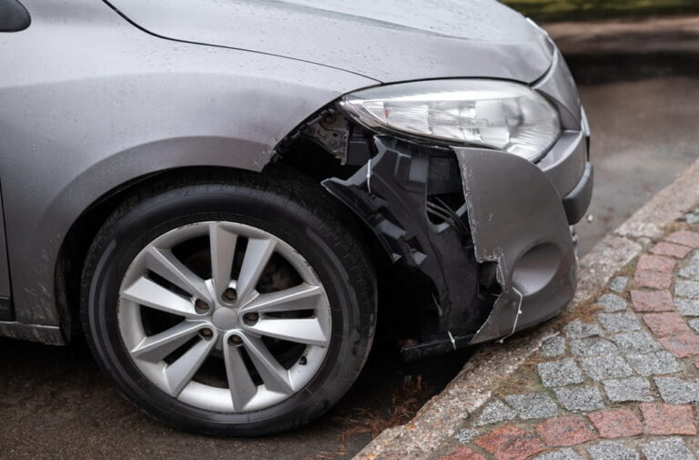 Hit A Curb At 30 MPH